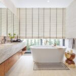 Principal bathroom with freestanding bath and twin vanity