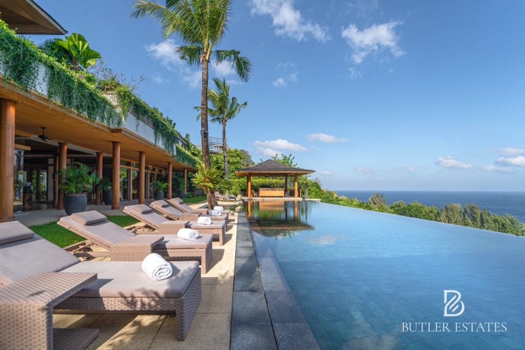 Infinity pool and sun loungers at a hillside villa above Phuket’s west coast, from Rex Butler’s guide to Phuket property investment